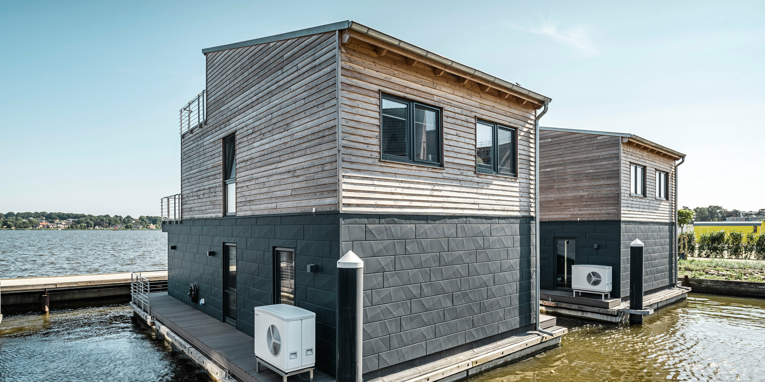 PREFA Siding.X Aluminiumfassade umhüllt elf Wasserhäuser im Pionierhafen Schleswig