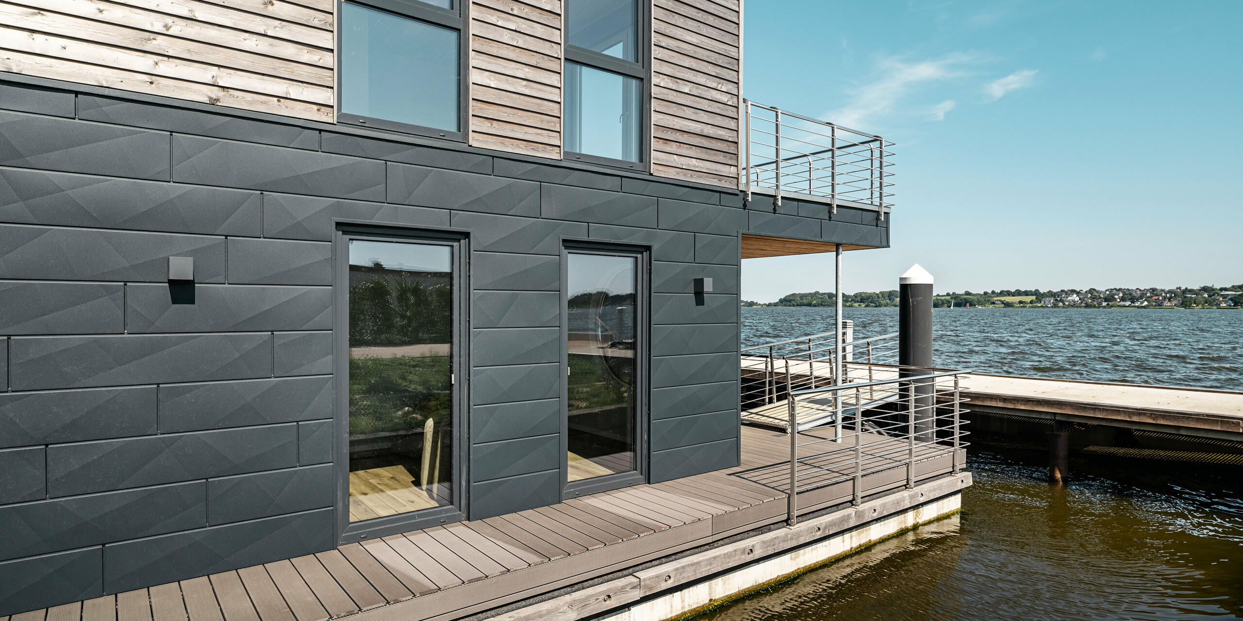PREFA Siding.X Aluminiumfassade umhüllt elf Wasserhäuser im Pionierhafen Schleswig