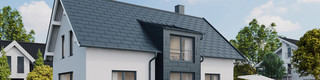 Einfamilienhaus mit Satteldach mit PREFA Dachplatten R.16 und Fassadenpaneelen FX.12 in P.10 Anthrazit 