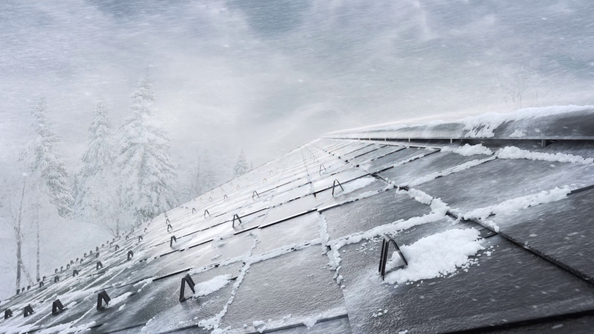 Frühjahrskampagne 2026 von PREFA – Ein schneebedecktes Dach mit Aluminiumplatten, das in einem winterlichen Sturm steht. Im Hintergrund sind verschneite Bäume sichtbar. Die Platten sind mit Schneerändern bedeckt, und die Dachrinnen sind teilweise von Schnee umgeben.