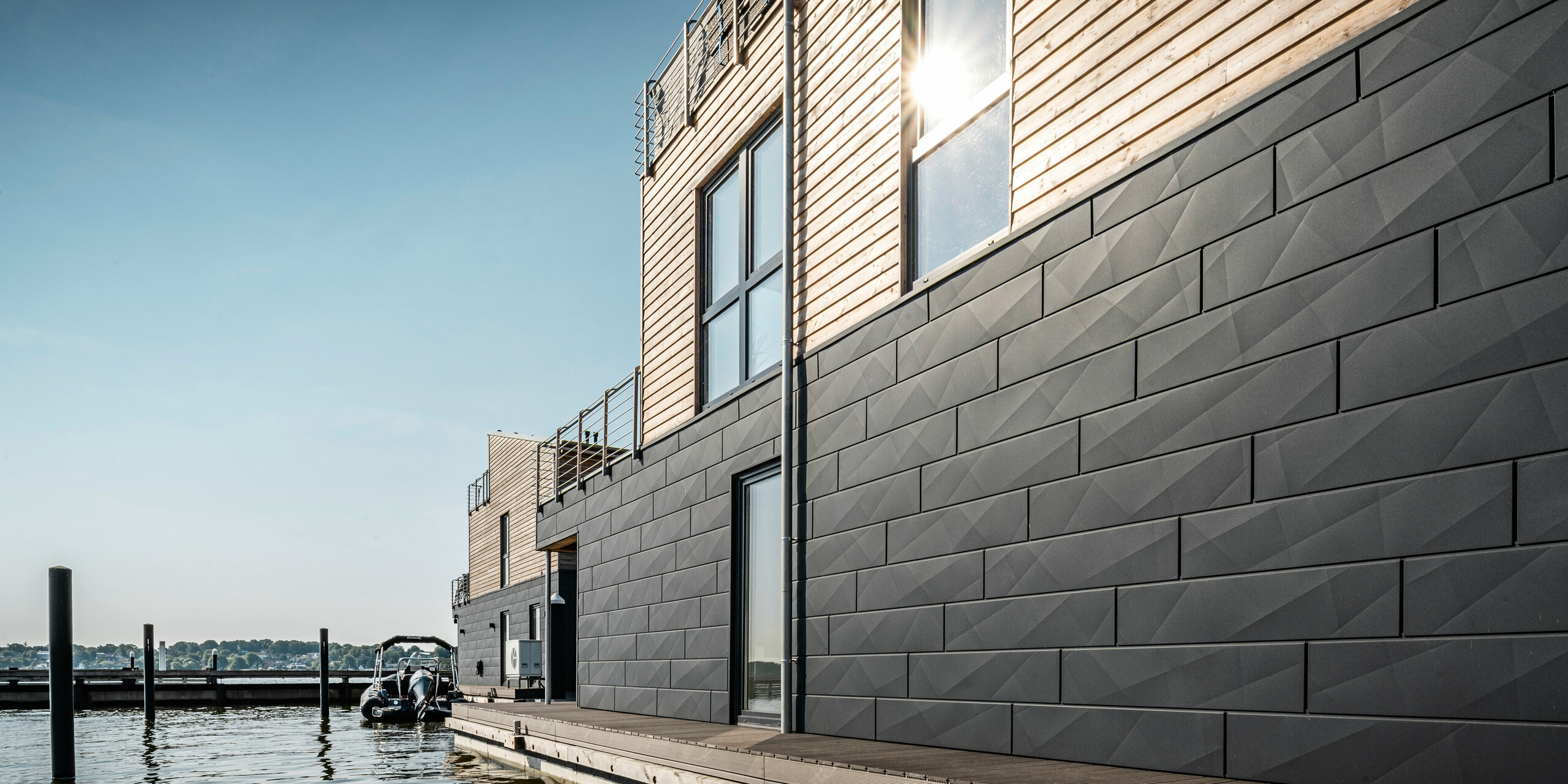 PREFA Siding.X Aluminiumfassade umhüllt elf Wasserhäuser im Pionierhafen Schleswig